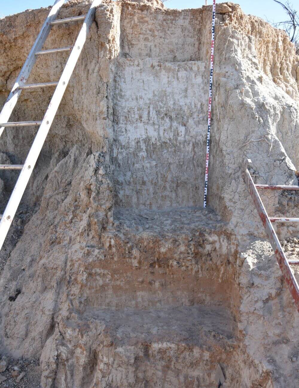 Stratigraphic sequence at Lovedale, featuring layers of sediment deposited by different processes and altered by soil formation. Stratigraphic sequence at Lovedale, featuring layers of sediment deposited by different processes and altered by soil formation.